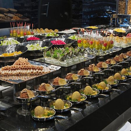 Doubletree By Hilton Istanbul - Piyalepasa Hotel Exterior photo A buffet of canapés